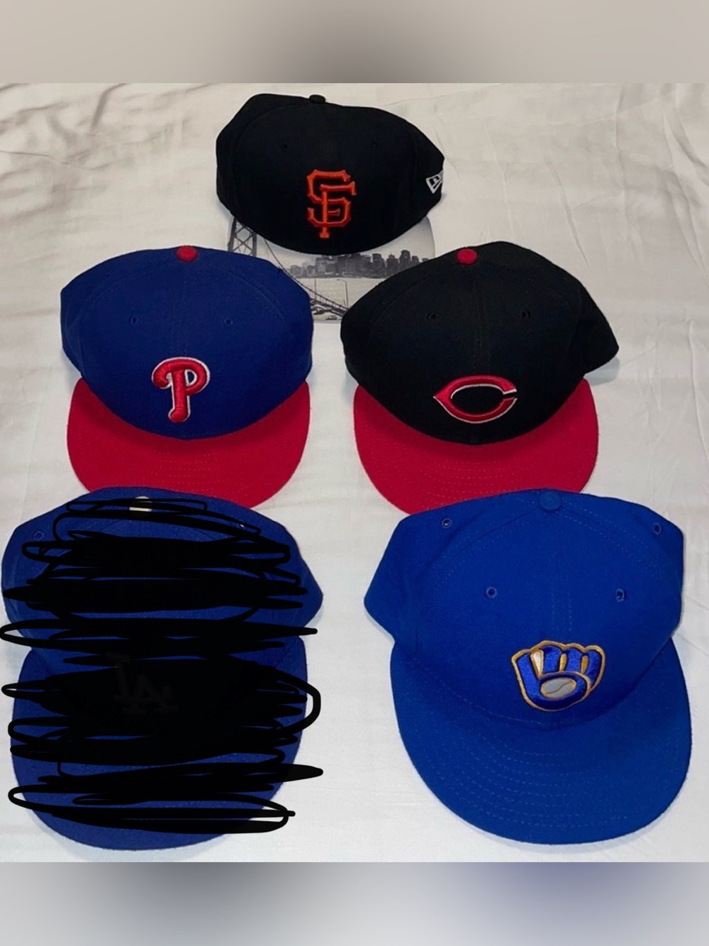 New Era Men’s fitted hat (sold individually)